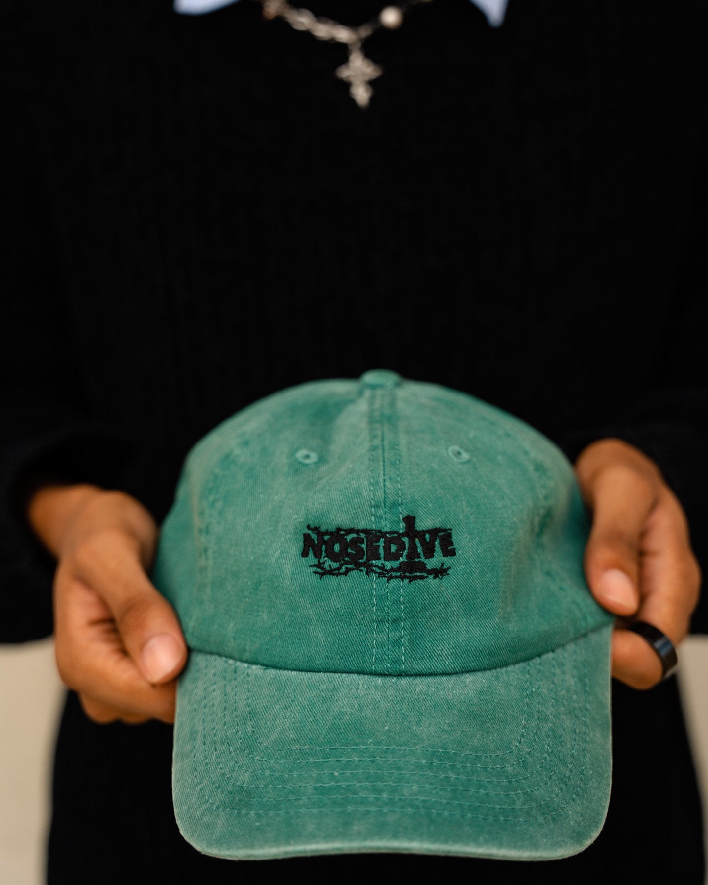 Nosedive Cap